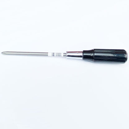 Screwdriver with black handle and silver blade on a white background