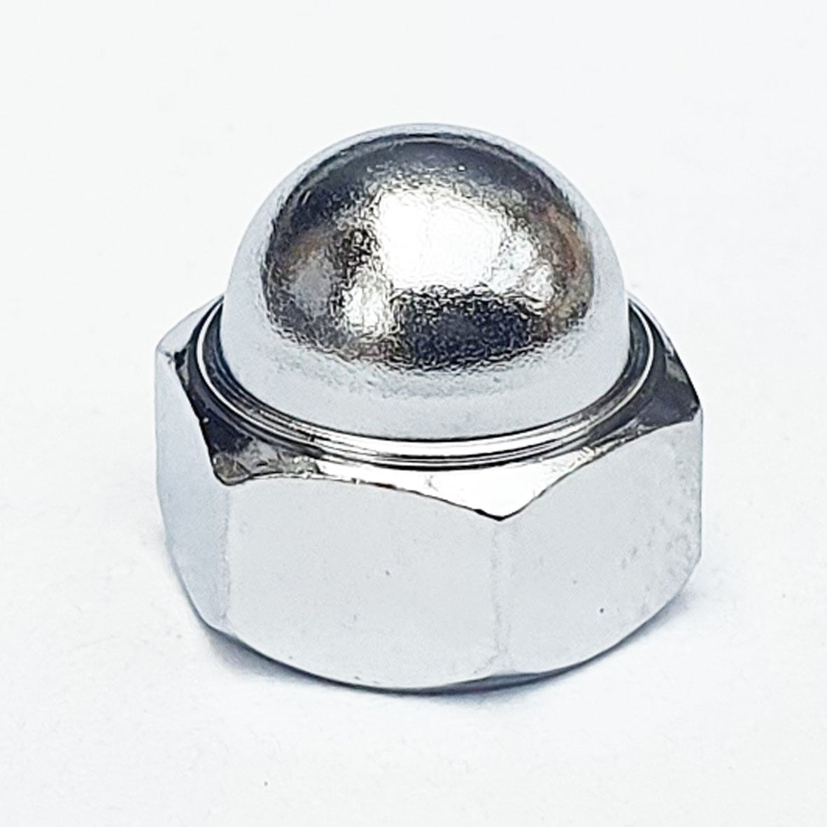 A chrome-plated, low top dome nut with a visible threaded section and a smooth, shiny finish. M5 Dome Nut Low Top Chrome Plated JIS 8mm A/F 322N0500